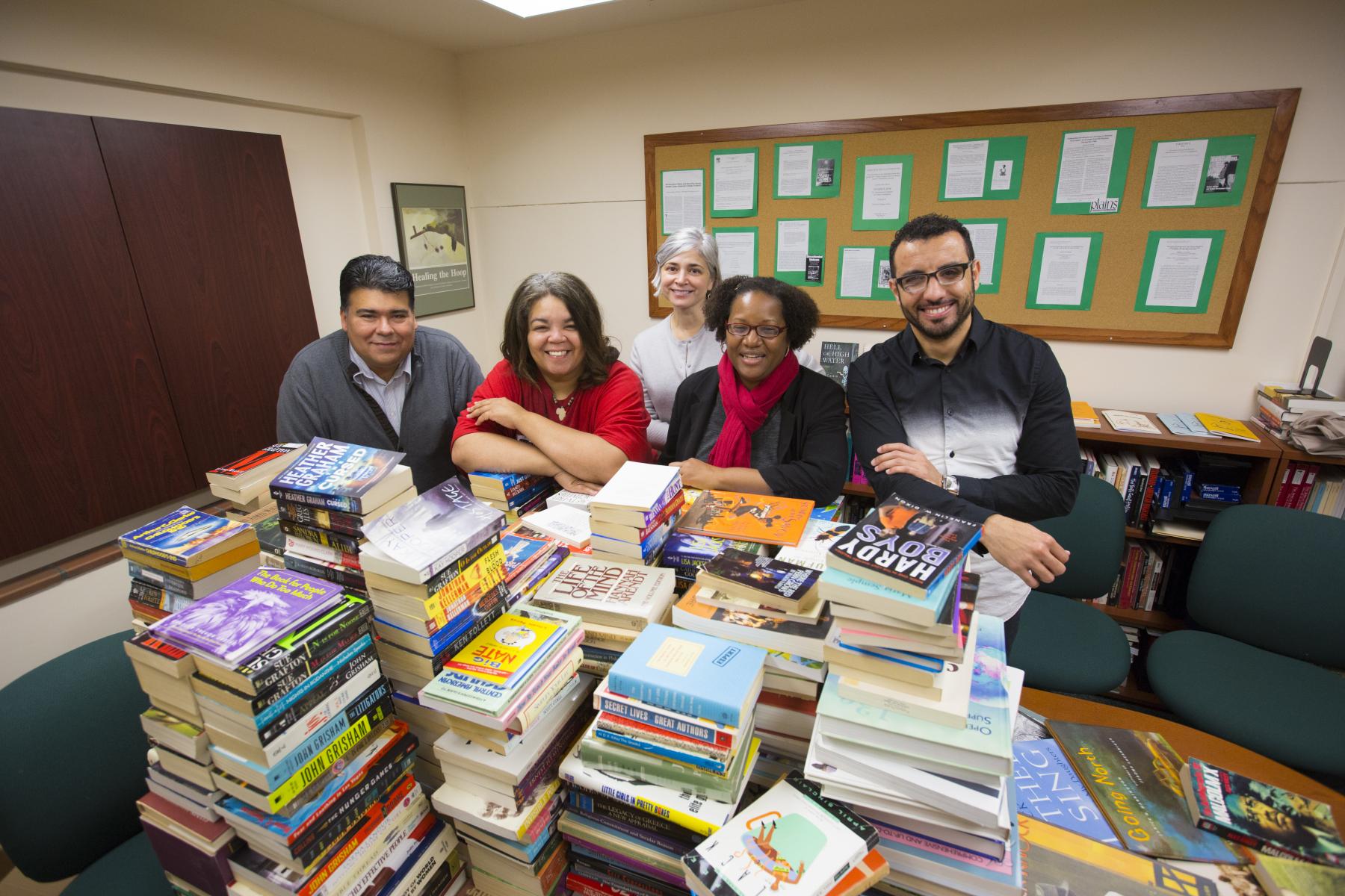 Group with books for Ferguson Library