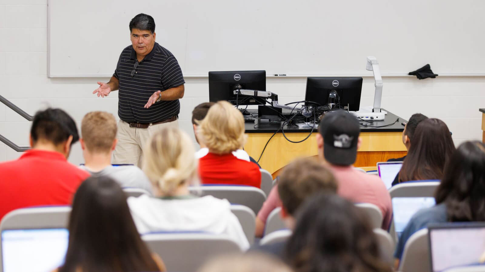 Professor speaking in front of a class